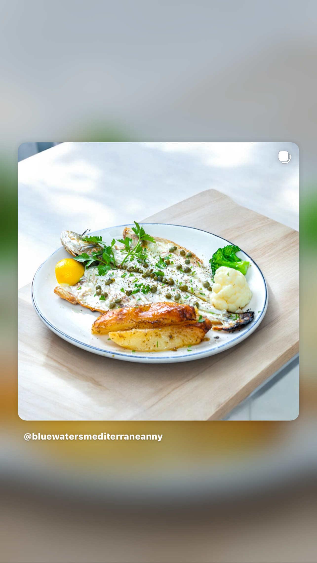 Grilled branzino with lemon potatoes and vegetables